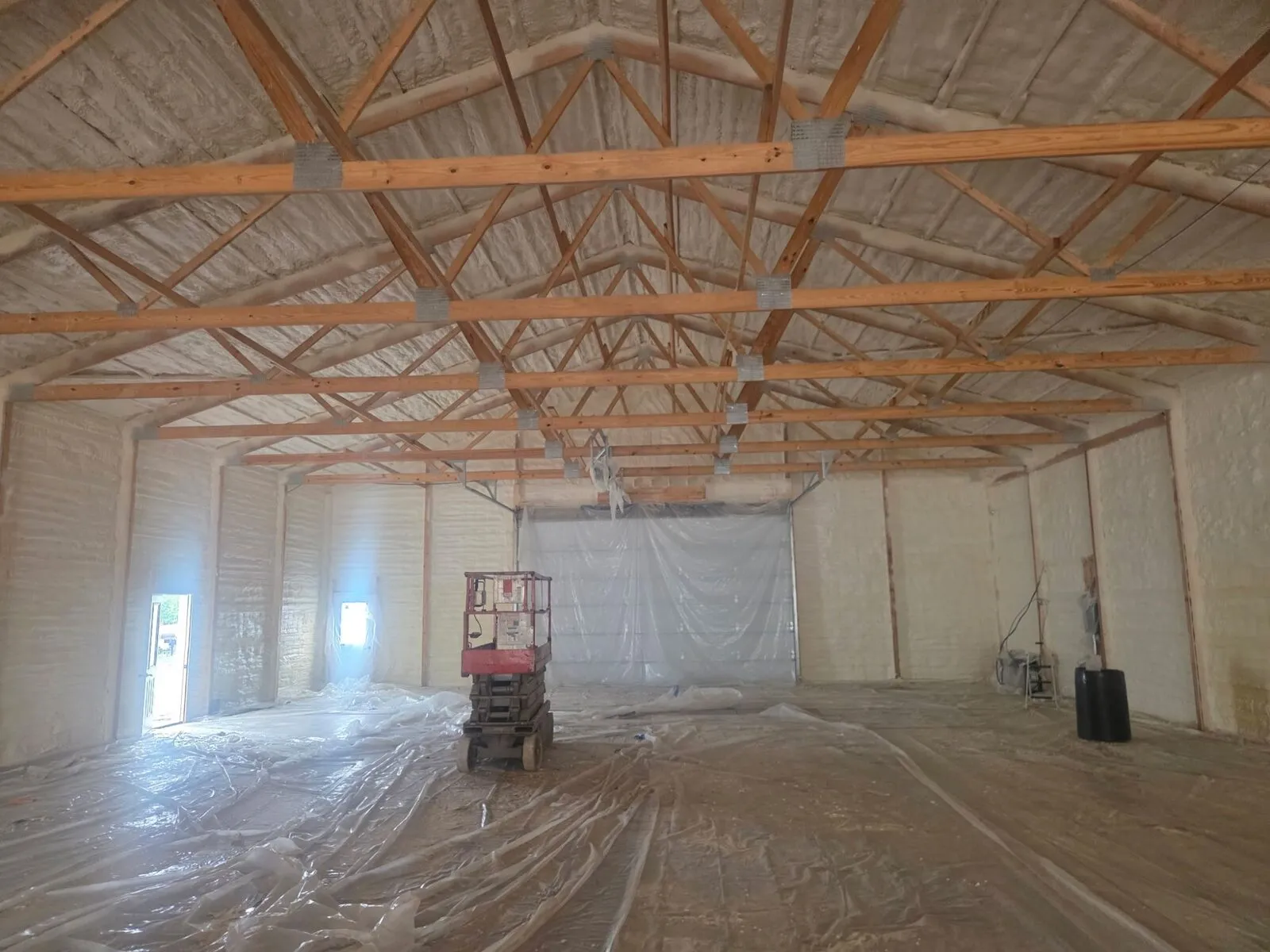 Closed-cell spray foam on the walls and roof deck of a large detached garage